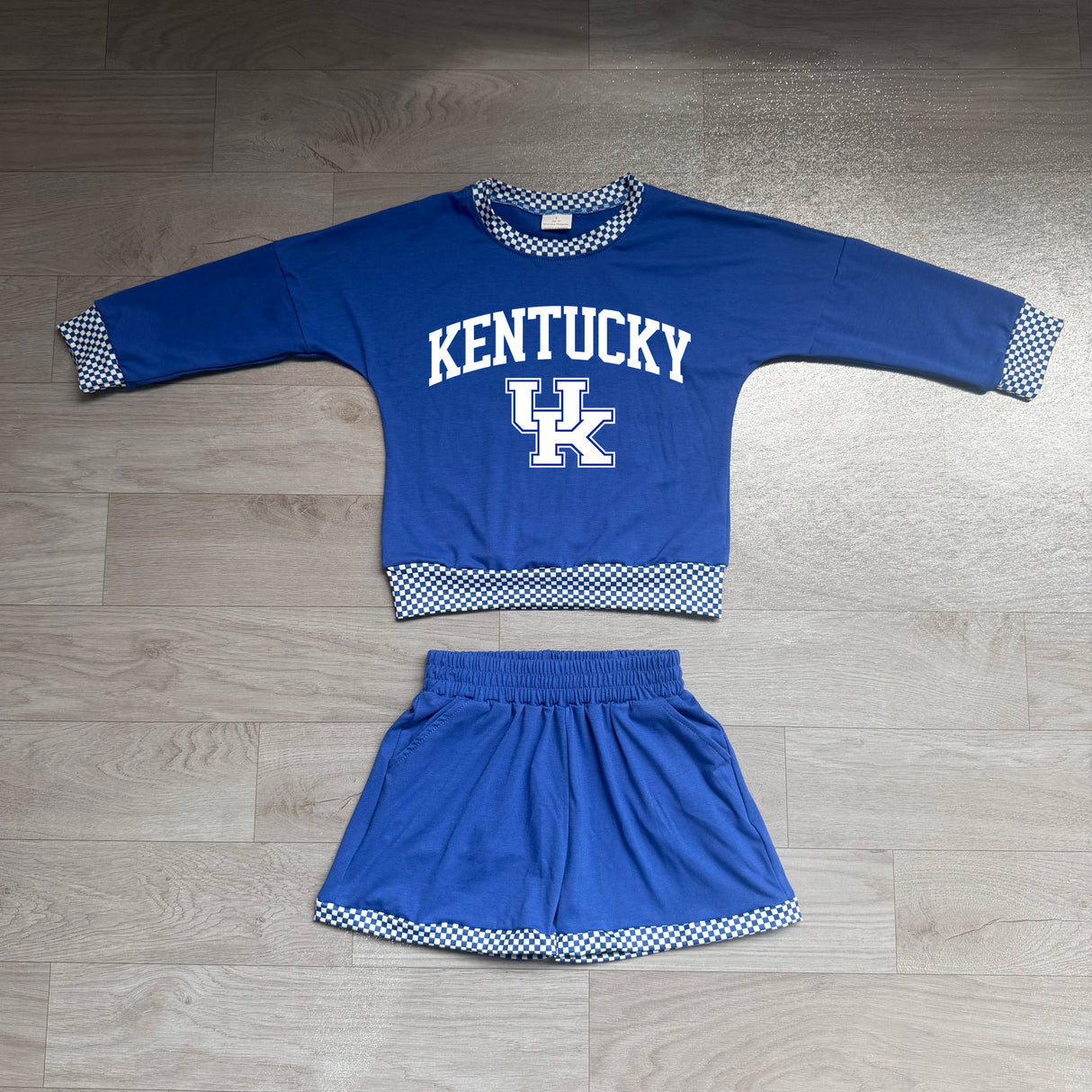 Long sleeves blue U K vinyl top shorts girls team outfits