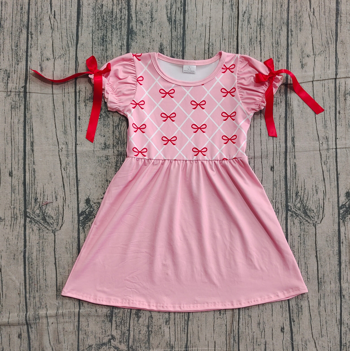 red bows girl ruffle sleeve pink dress