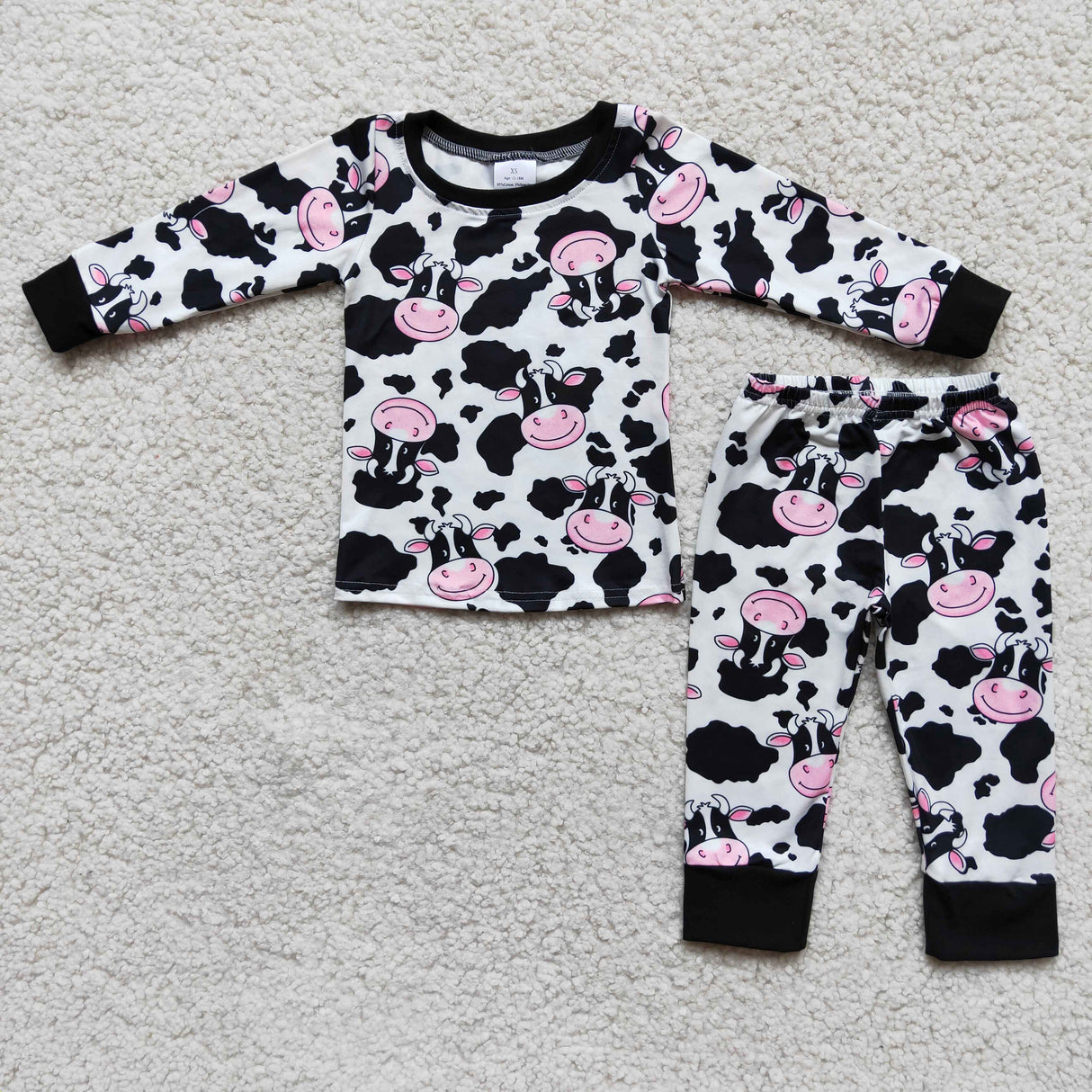 Cow print long sleeve girls pajamas
