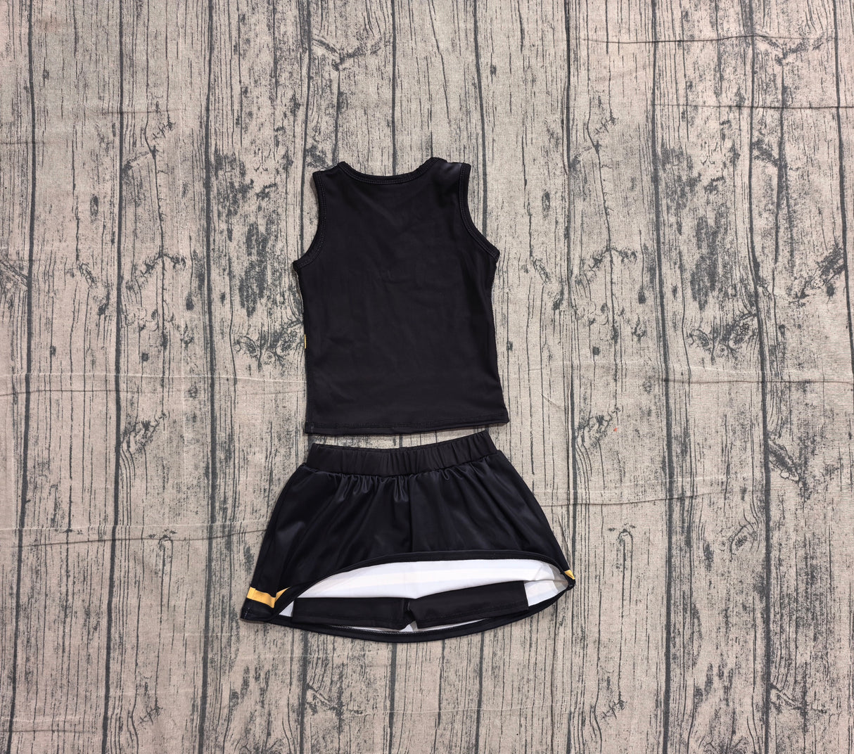 Sleeveless gold black top skirt girls team cheer active set