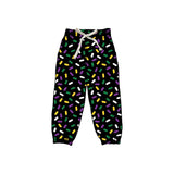 Purple yellow green ice cream sprinkle kids Mardi Gras pants