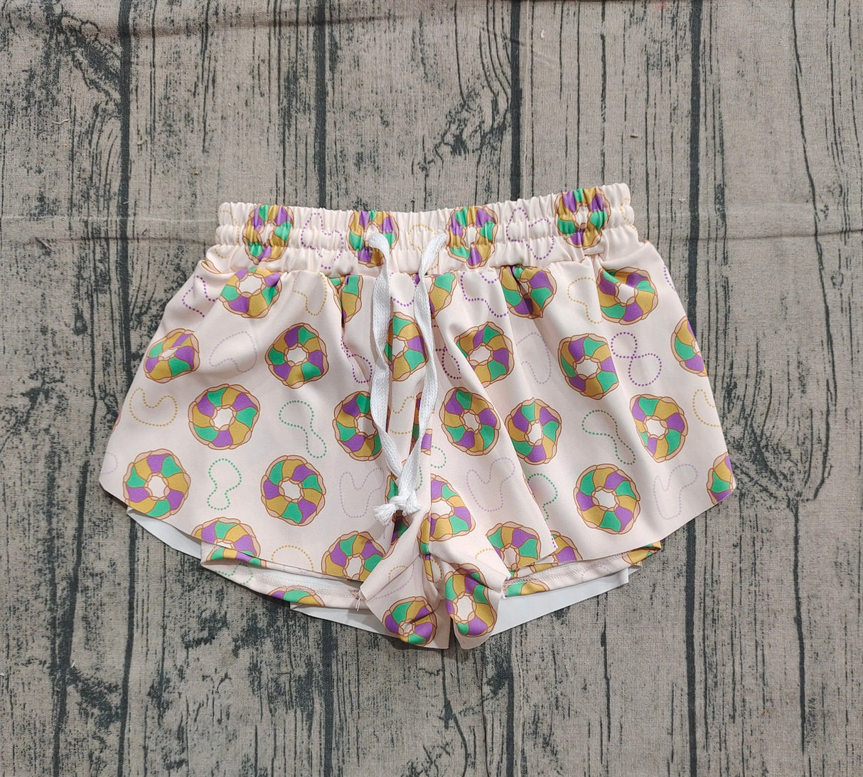 Purple green yellow donut kids girls Mardi Gras active shorts