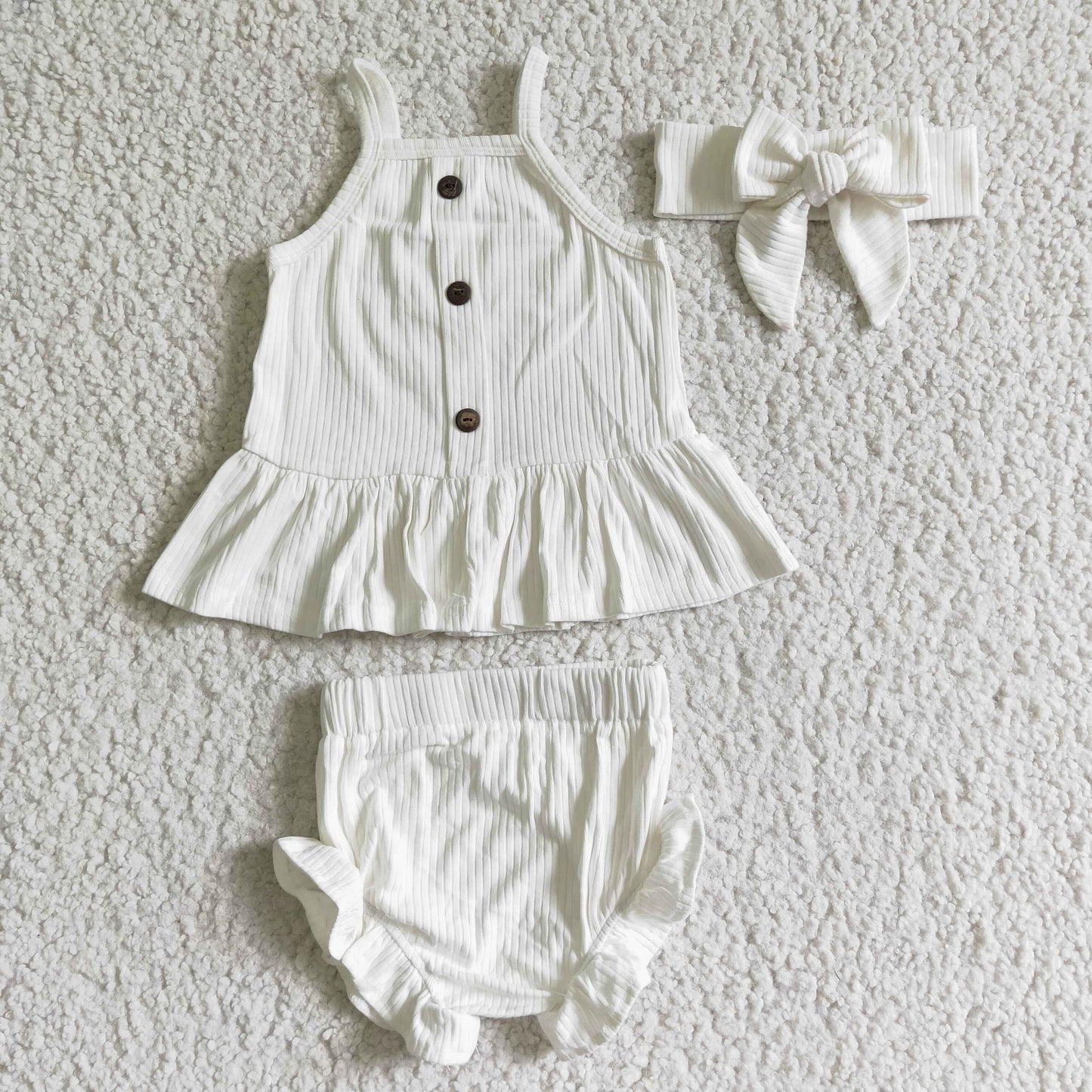 Sleeveless white cotton baby girls bummies set