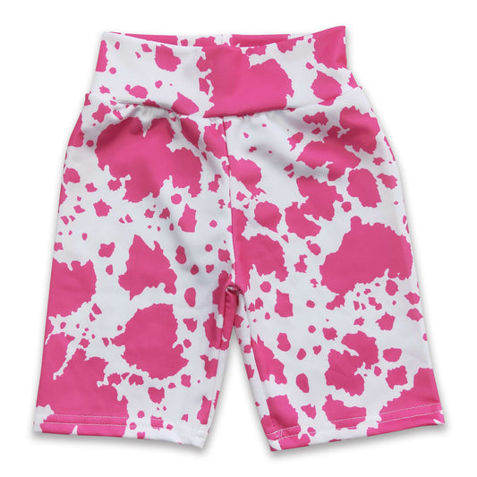 Pink cow print swim material baby girls shorts